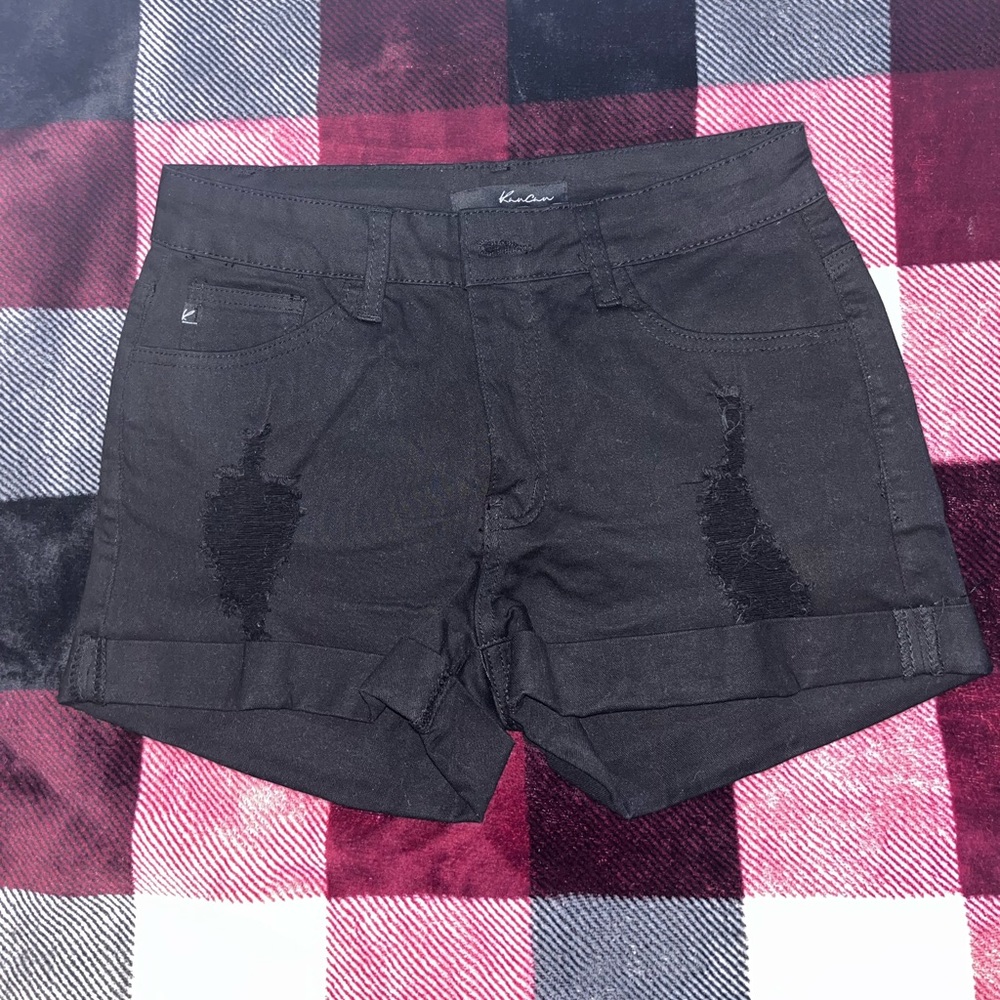 Women’s black distressed denim shorts